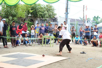 Lestarikan Permainan Tradisional, Mahasiswa Kukerta UNRI Gelar Festival Budaya Gasing
